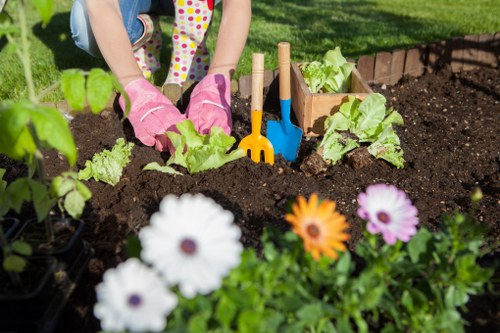 Local flower bed installation with soil preparation and edging